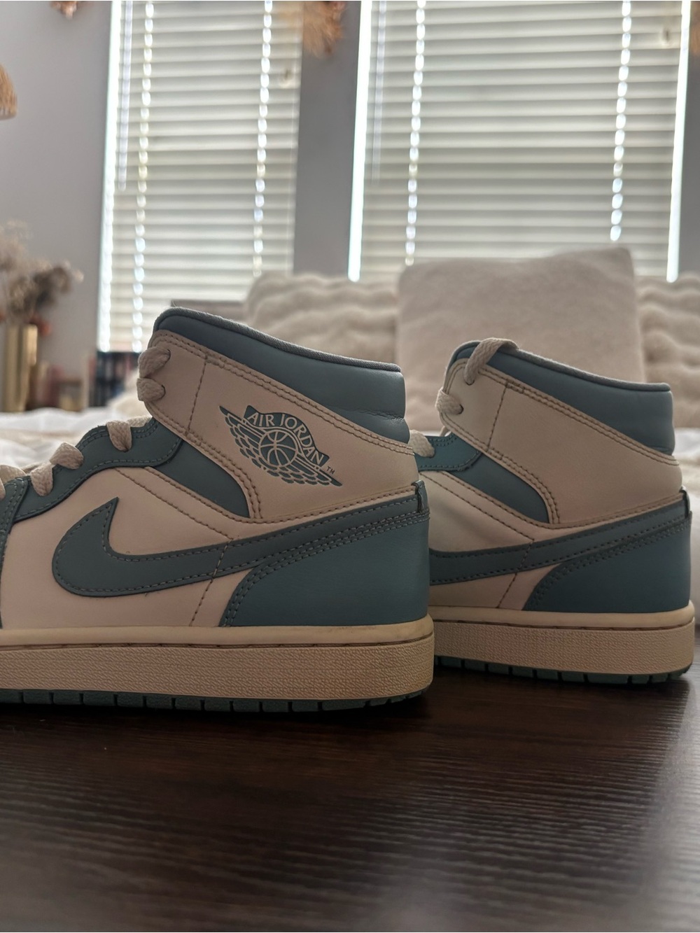 Jordan Air Jordan 1 Mid White and Teal Sneakers